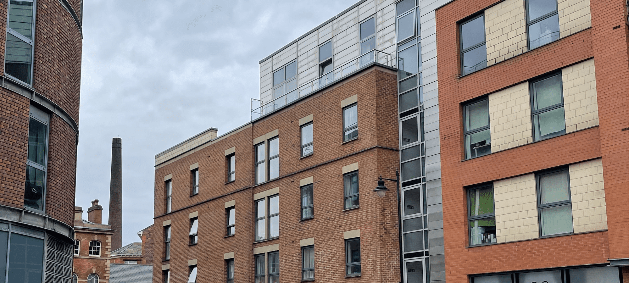 Sheffield skyline featuring multiple red brick residential buildings