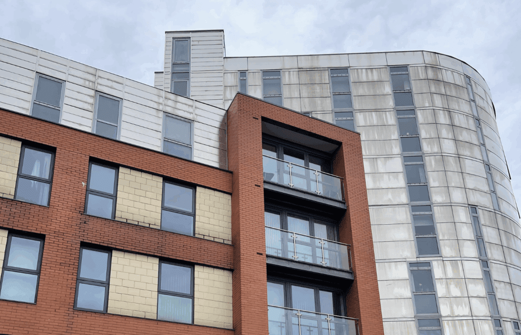 Red brick high rise building - Daisy Spring Works